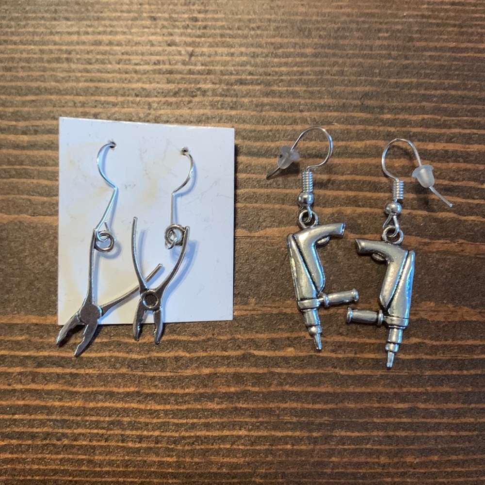 Costume earrings that look like tools